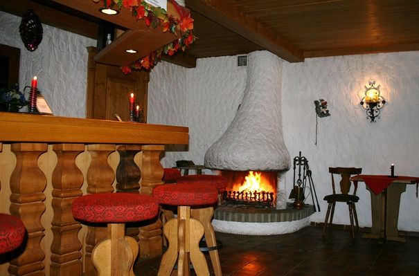 Kaminzimmer im Hotel Alp Inn